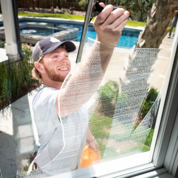 Window Ninjas Technician Cleaning Window Window Cleaning Web Image Window Ninjas