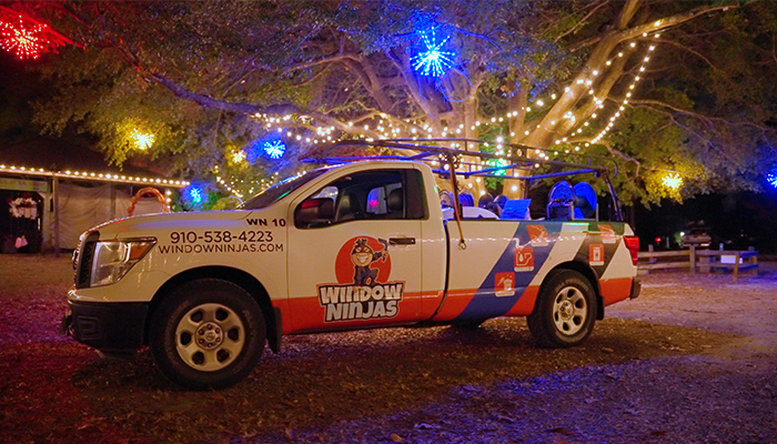 window ninjas truck with holiday lights