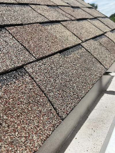 An image of a roof that has been pressure washed by a professional like Window Ninjas.