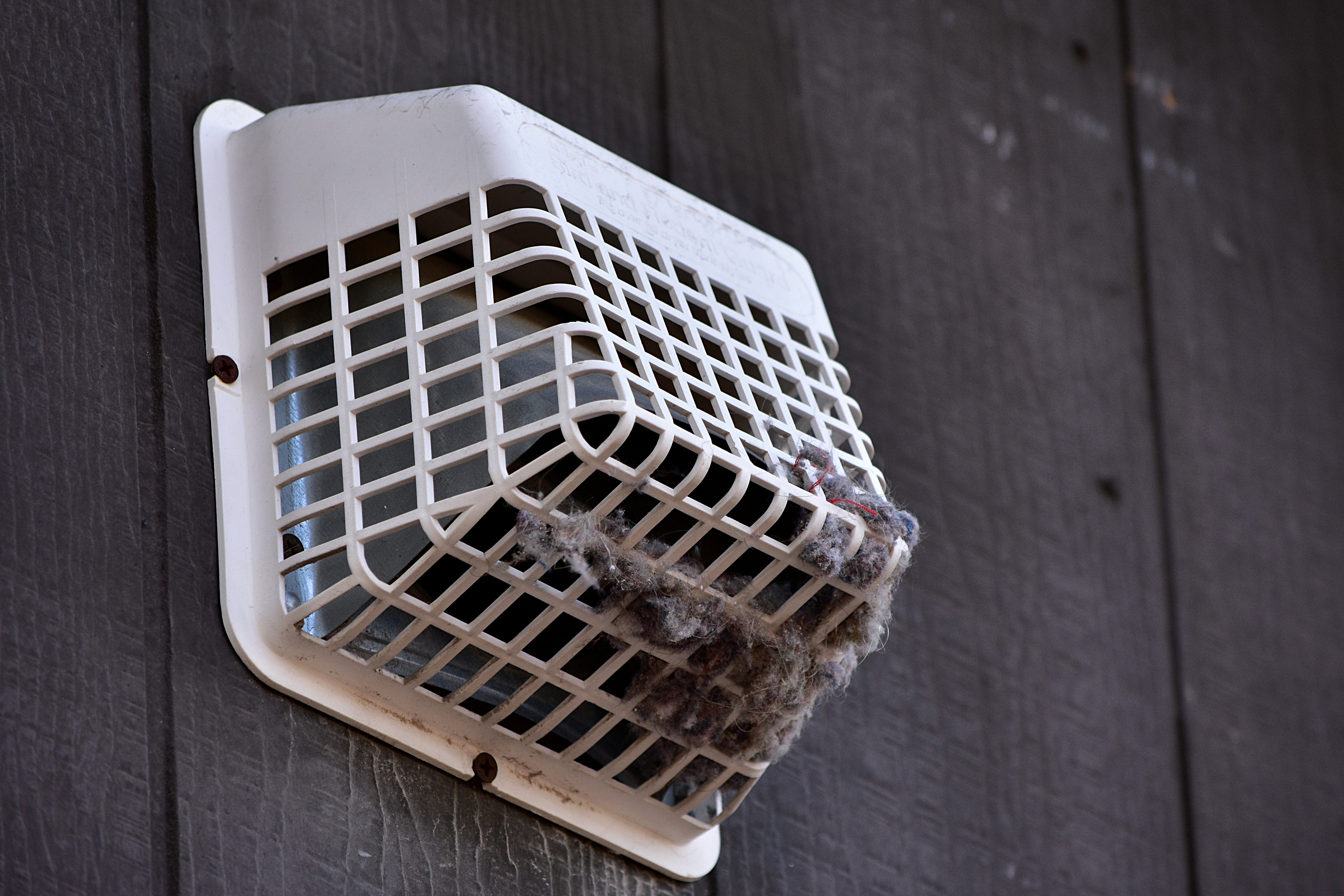 A dryer vent - Window Ninjas offers cleaning services for dryer vents on commercial buildings.