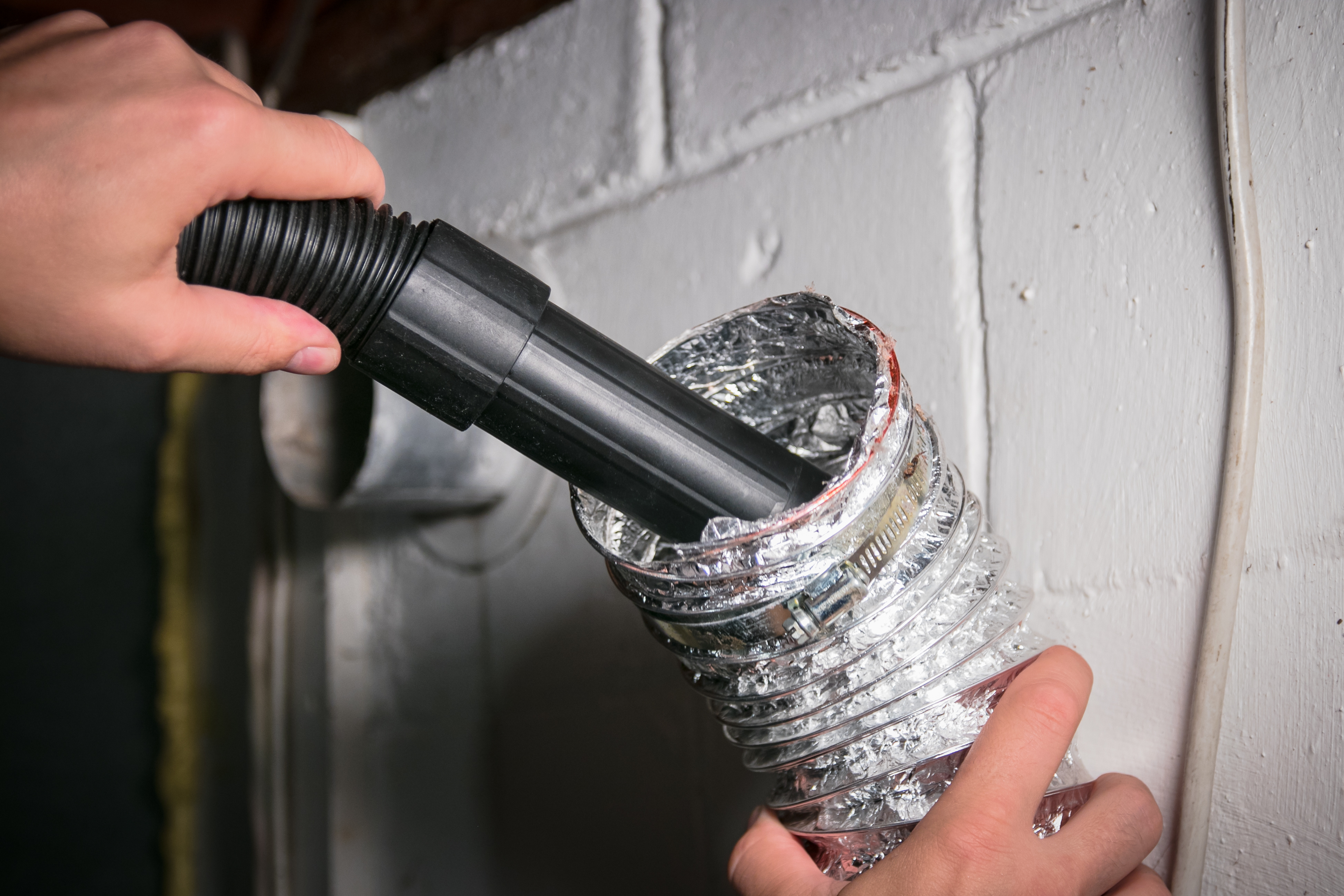 An interior dryer vent cleaning by Window Ninjas, a dryer vent cleaning company.