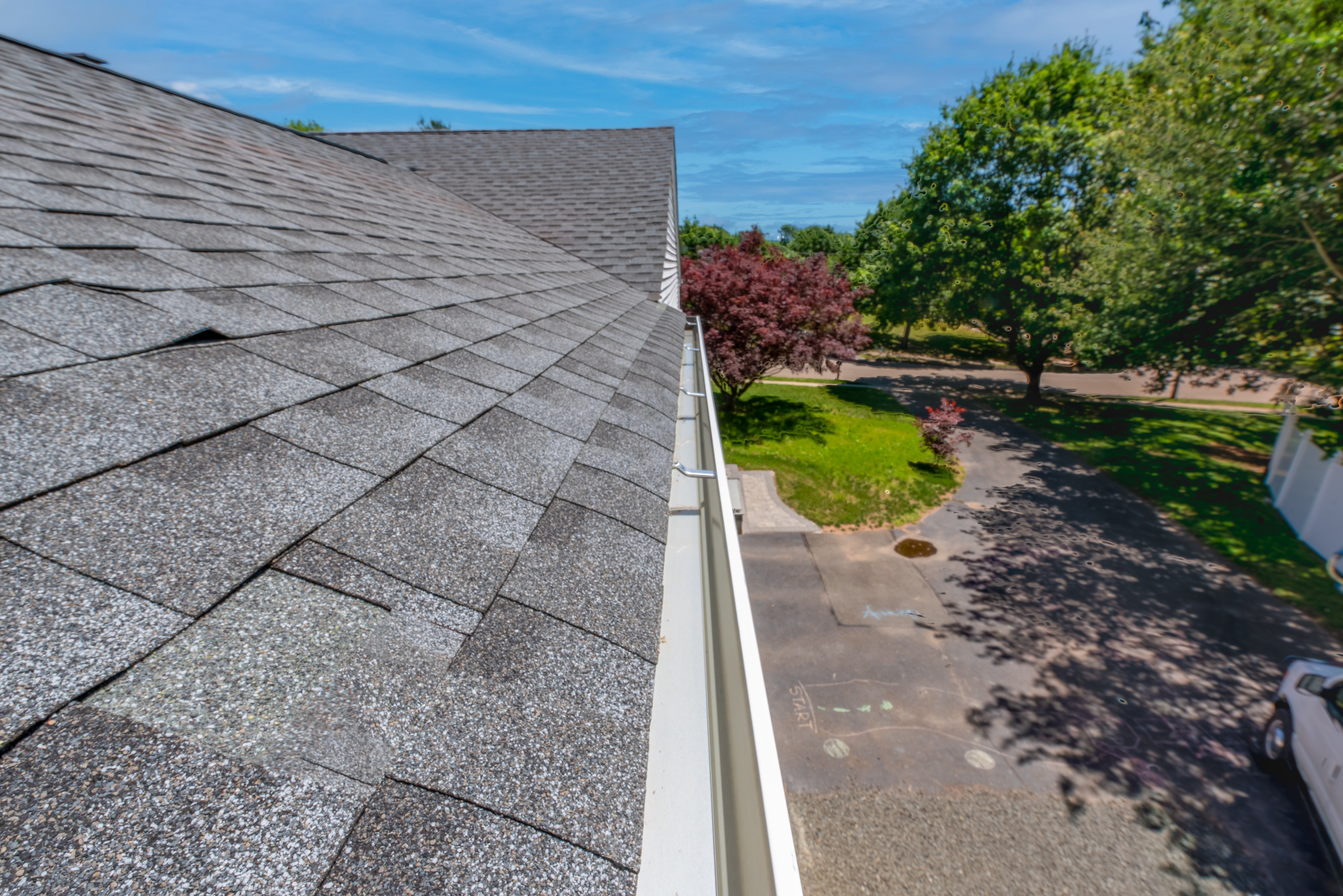 An image of gutter cleaning - contact Window Ninjas for a free estimate on your gutter brightening.