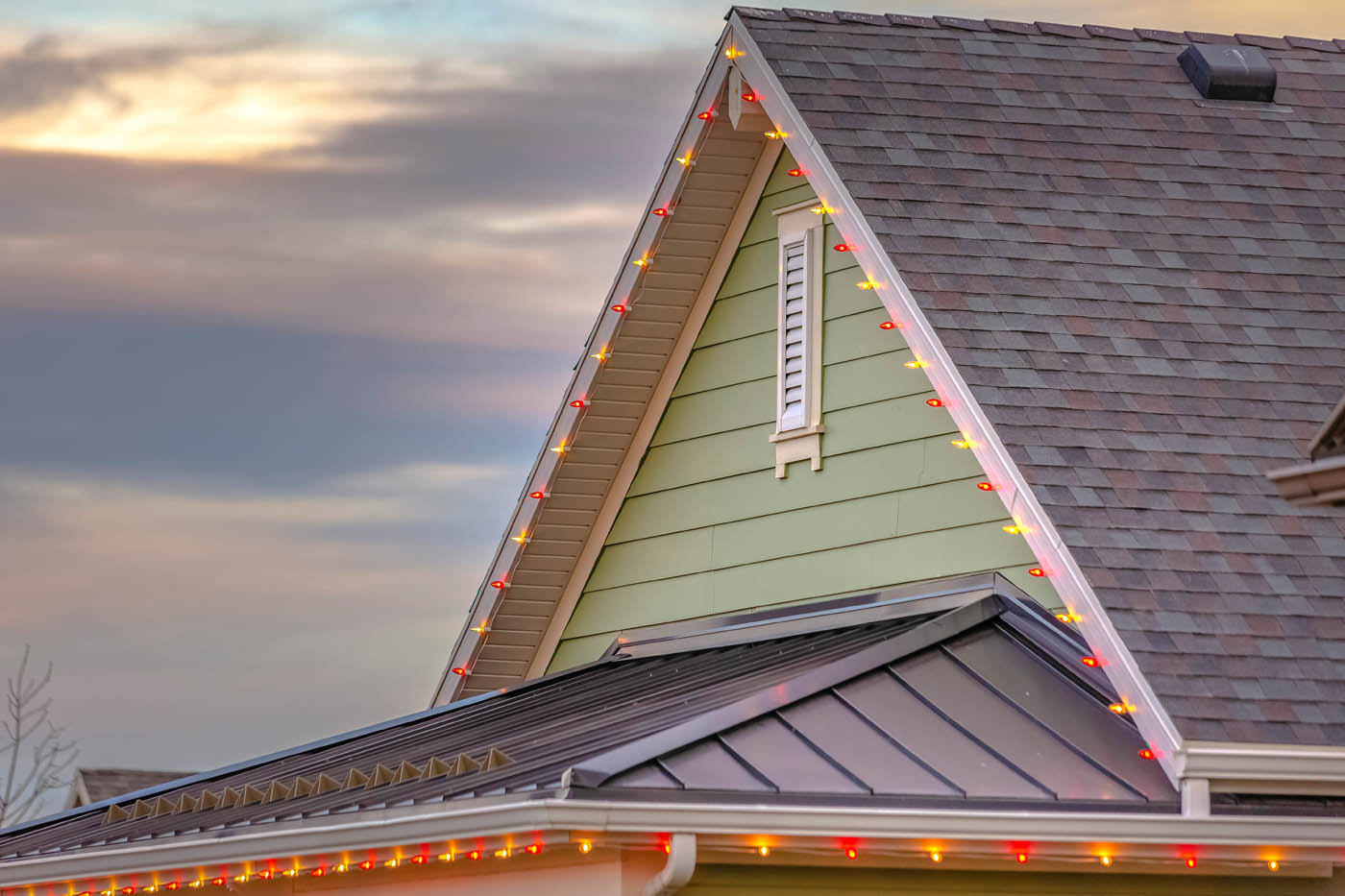 A home decorated with Christmas lights from the installers at Window Ninjas.