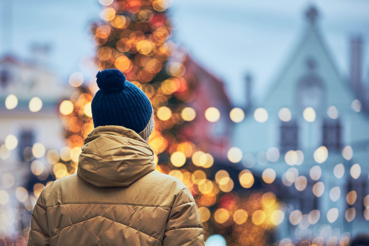 A person enjoying the benefits of their holiday light installation from Window Ninjas.