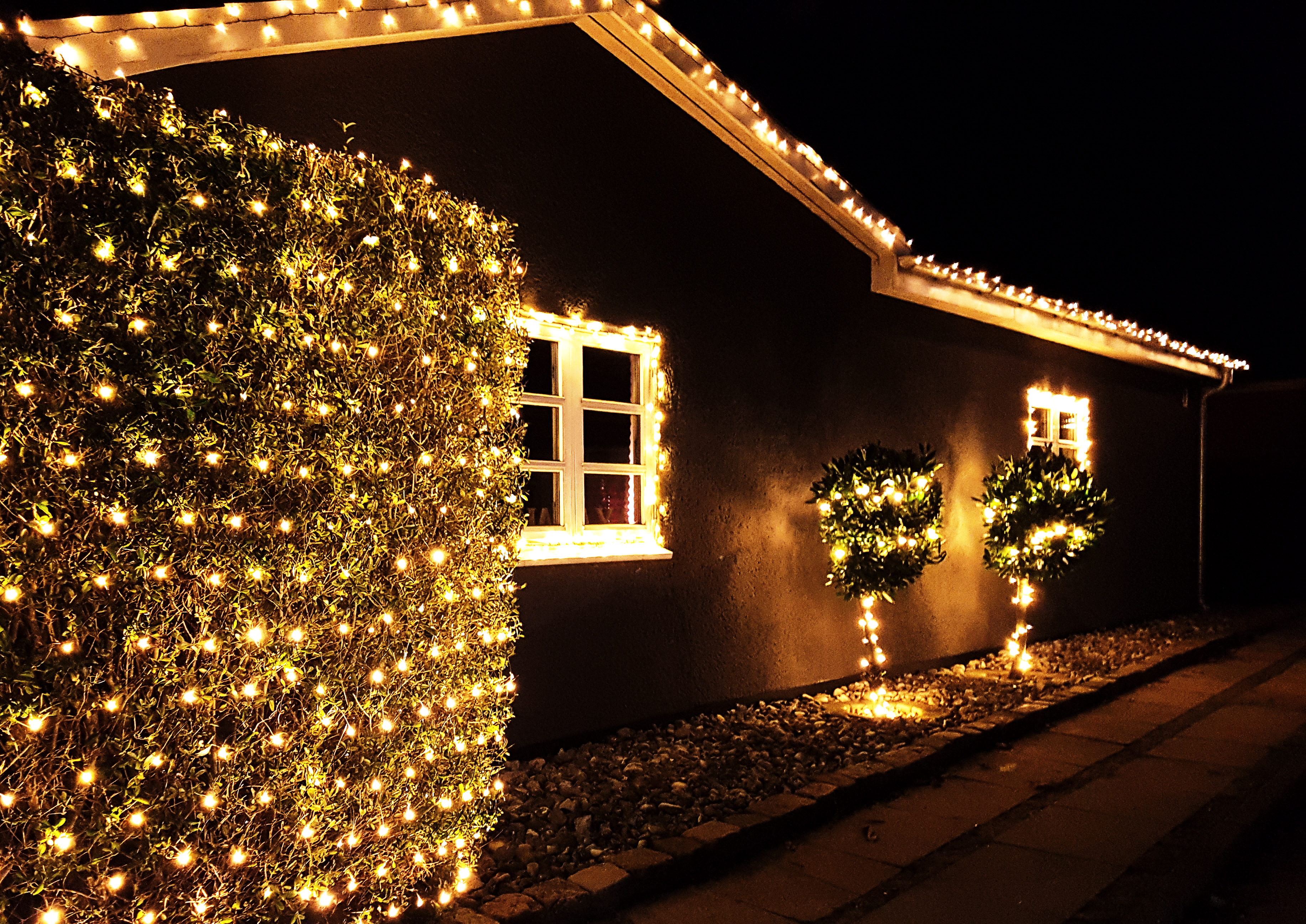 Beautiful holiday lights on a home - Contact Window Ninjas, the most reliable Greenville outdoor christmas decorators.