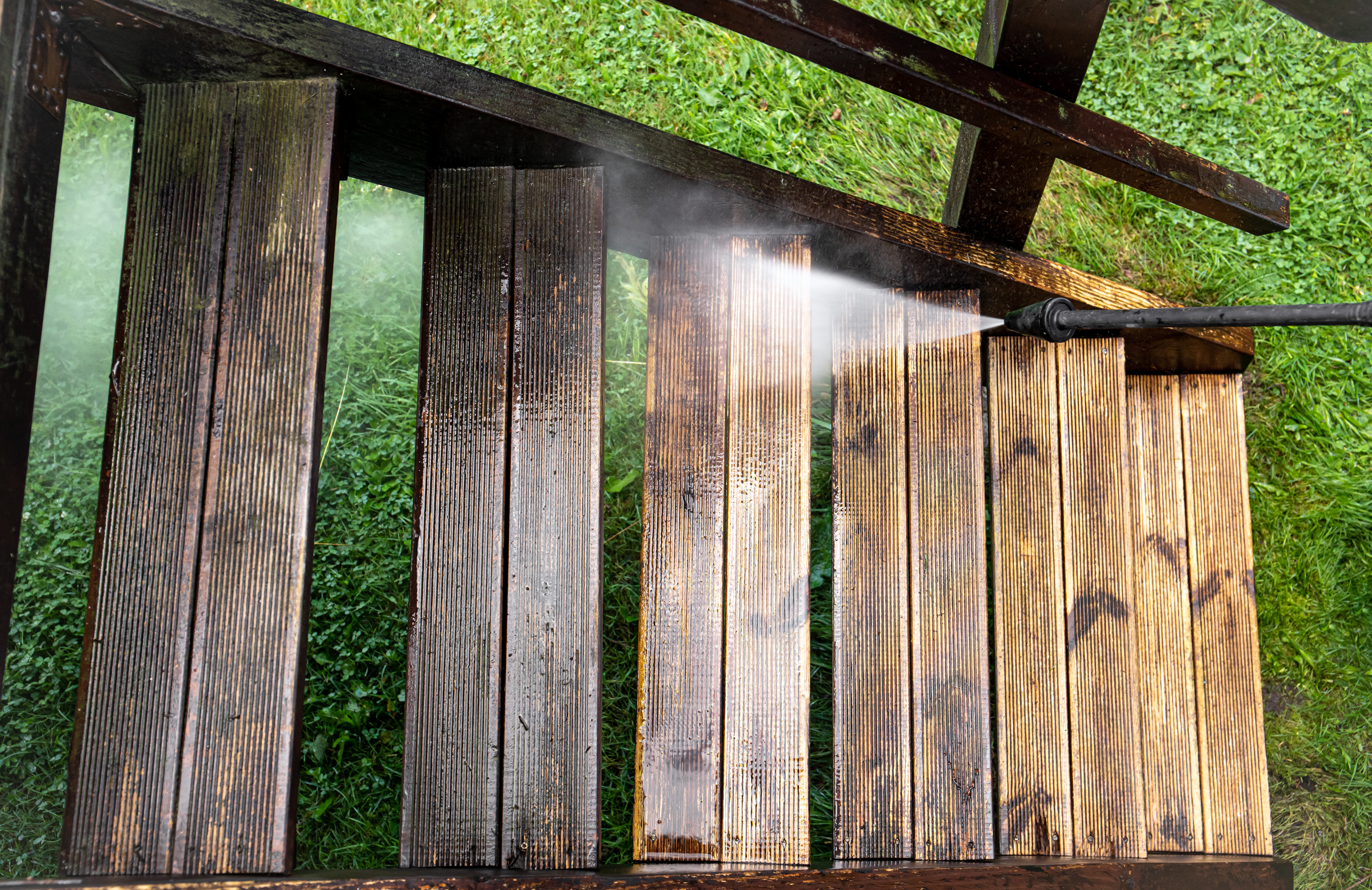 An image of deck pressure washing for stairs - get your deck pressure washing from Window Ninjas today.